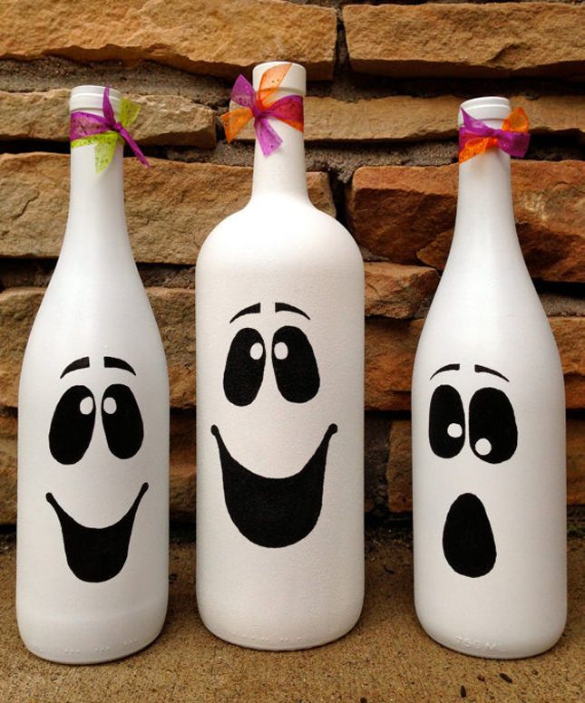 a bunch of winebottles could be easily turned into a Hcute halloween ghosts arrangement