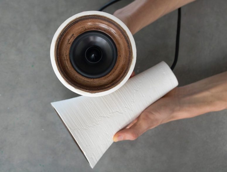 The speakers are made of wood PLA and a resin mix and look as if they are really ceramic ones