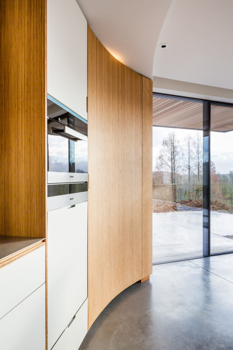 Practical Vibrant Kitchen With Minimalist Cabinets - DigsDigs