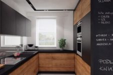 02 a matte black kitchen with natural wood surfaces looks modern, edgy and is very functional