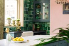 03 a green tile wall looks nice with grey cabinets and adds a cool bright touch to the kitchen