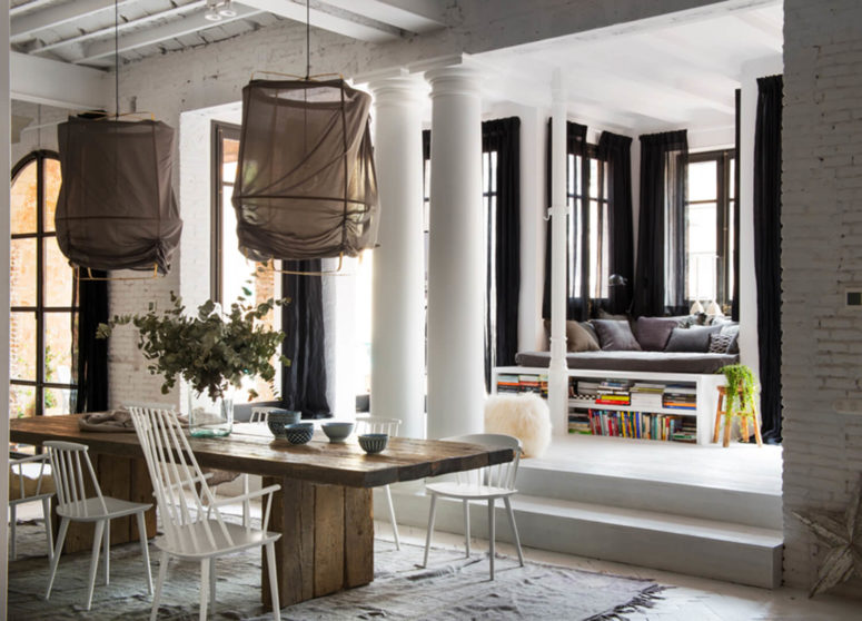 There's a platform zone with a very cozy reading nook surrounded by windows, with a comfy seat and book storage inside