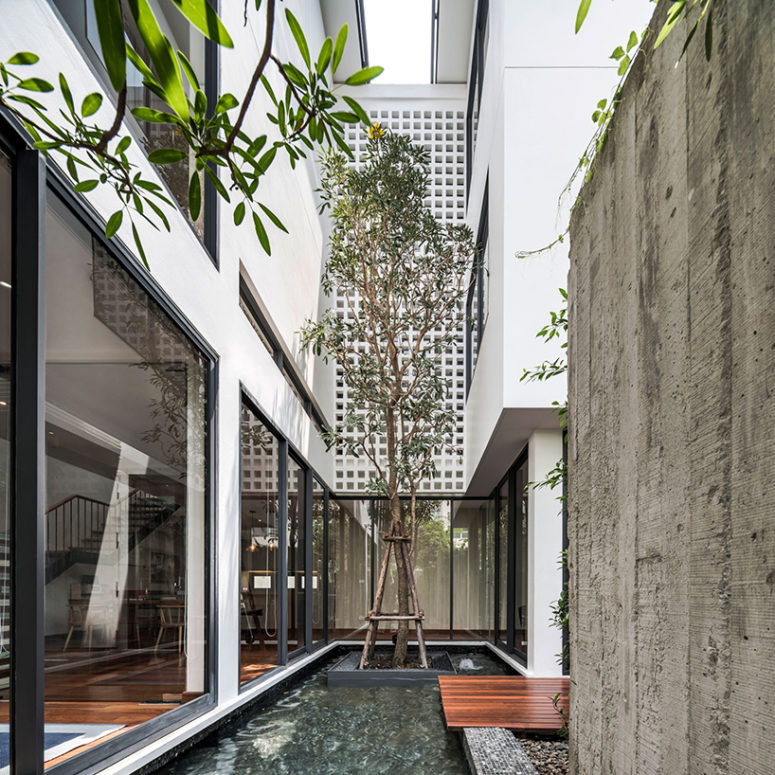 The architectural language of the building is articulated within the relationship among the small open courtyards