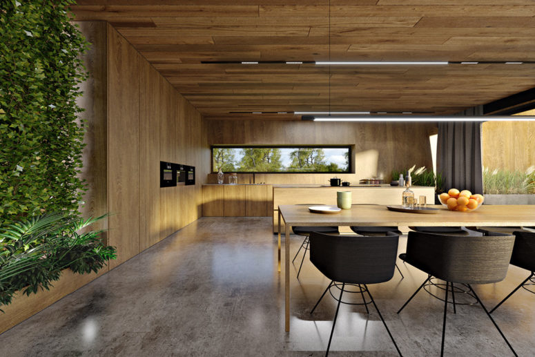 The dining zone is done with a wooden table and black modern chairs