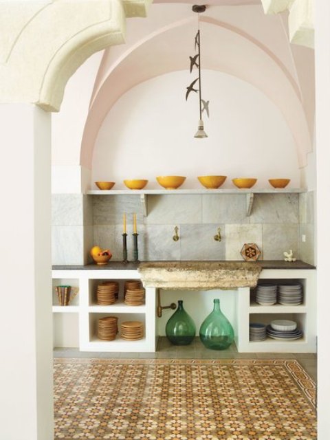 The Italian floor tiles in the kitchen were found in an architectural salvage in Lebanon