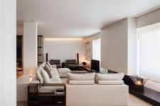 07 a comfy neutral space is spruced up with dark-colored furniture