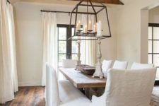 08 a shabby chic dining room features a vaulted ceiling with exposed wooden beams