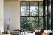 09 a chic modern space connected to outdoors, clean-lined furniture and glazed walls