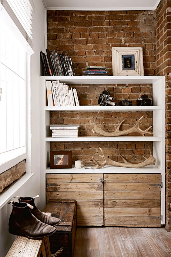 a modern masculine entryway with a simple antler display to highlight the manly style
