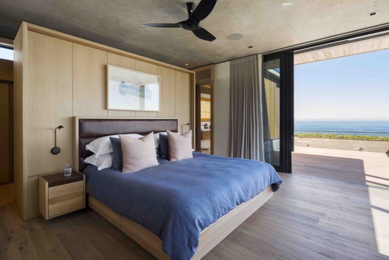 Sliding glass doors bring in fresh air, light and panoramic views of the sea