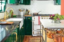 12 a bold emerald kitchen is made more eye-catchy with brass handles and a white tile backsplash