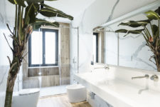 13 The floating vanity contributes to the roominess of the bathroom