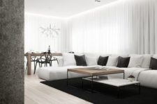 14 a clean living space united with a dining room, lots of white keeps the space lighter