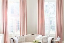 25 a chic living room with pink curtains and brass touches for a soft feel