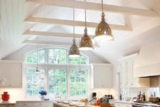 26 hang lamps lower to make changing bulbs and dusting lamps easier