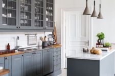 30 vintage graphite grey kitchen with whitewashed wooden floors, wooden countertops and white walls to make it look fresher