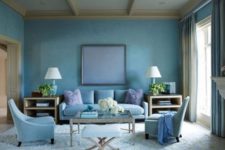 a blue space with grey as an additional color and light-colored ahy wood create a very relaxing ambience
