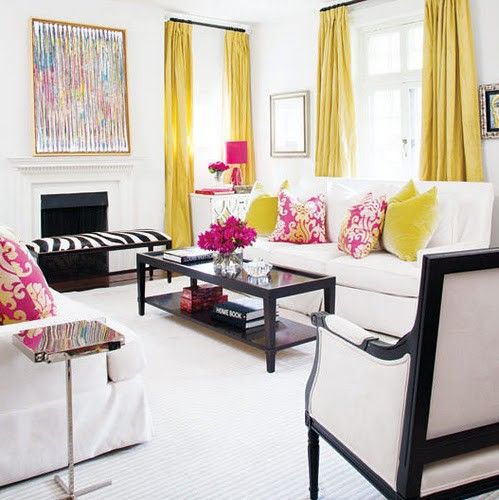 a chic and bold white space is made more colorful with yellow and fuchsia, and black highlights the decor