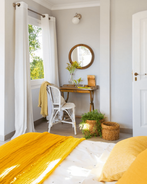 dove grey as the main color, white as additional and sunny yellow accents create a sunny and bold interior