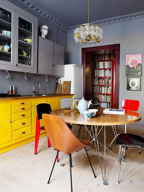 greyish purple is taken as the main color here, natural wood adds chic and bold yellow and red create a colorful accent
