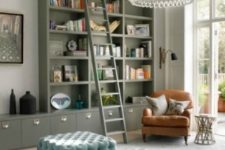 white is the main color here, grey is added in furniture and rugs, and you can see blue ottomans as accents