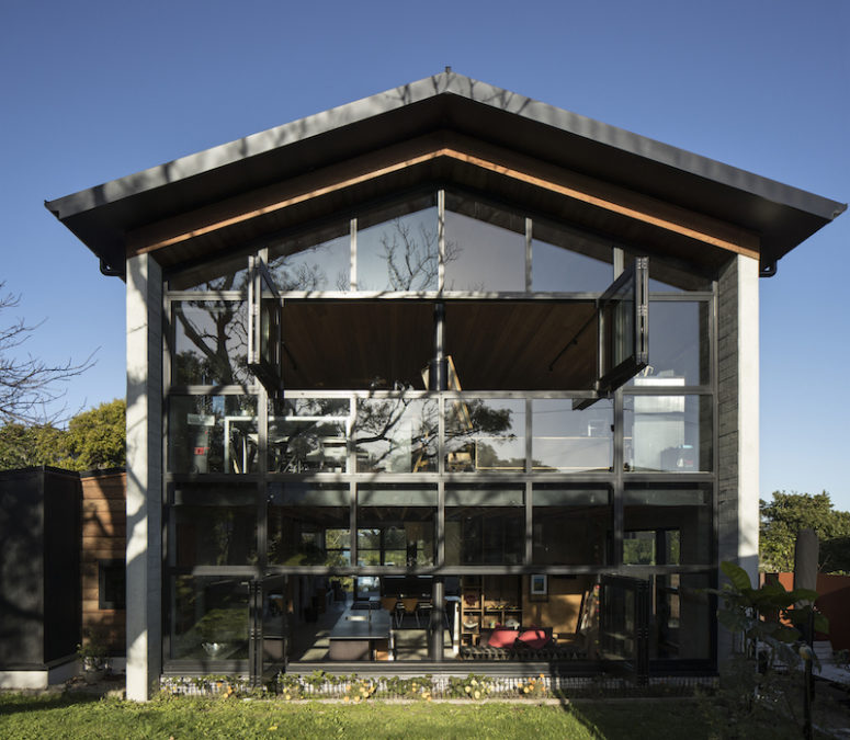 Glazed Facade House Organized Around A Spiraling Core
