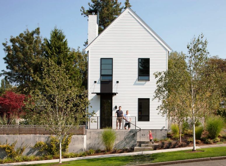 This urban farmhouse features cozy and welcoming interiors and terraces