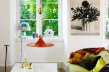 02 A lemon yellow corner sofa and colorful lamps and pillows create a cool and bold boho space, which raises the mood