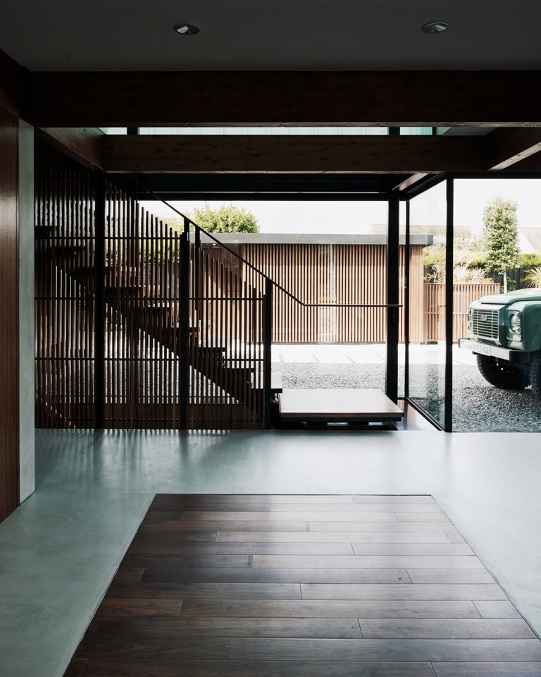 The house is extensively glazed to catch the views and there's much wood in decor, stone is also used for inner and outer decor