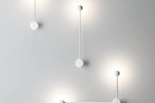 02 The lamps are available in black and white and you can find wall and sconce versions with similar design