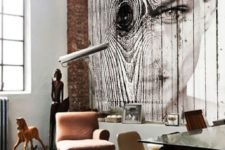 02 an industrial space with a wall covered with wood and a gorgeous photo art applied right to the wood