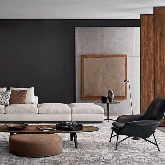 just one black wall makes a gorgeous statement in this modern space with earthy colors