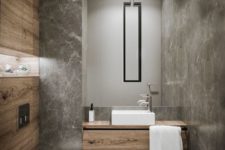 02 using grey marble tiles and wood-looking tiles is a chic and creative solution for a powder room