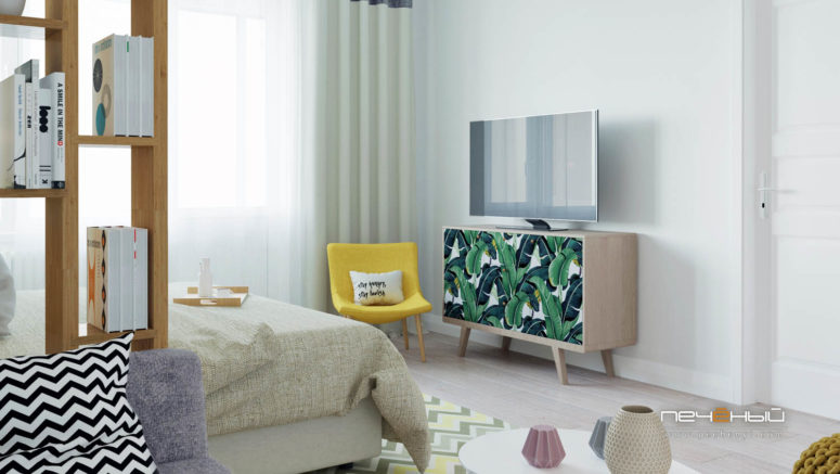 A colorful chair, a TV placed on a credenza with a banana leaf print and pastel textiles add a vivacious touch