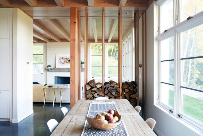 simple yet cool fireplace This stack adds coziness to the space reminding us that it's a winter holiday retreat plus the wood can be used for the fireplace