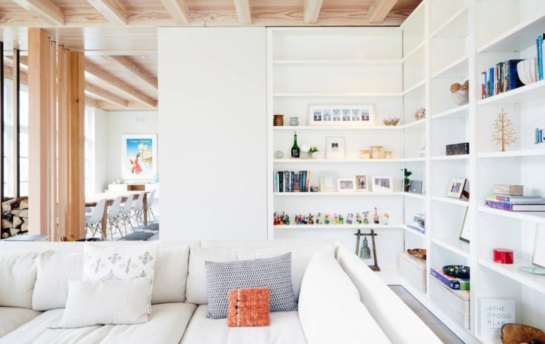 practical storage unit A large shelving unit is a great piece for storage, and as it's white it doesn't seem so large or bulky