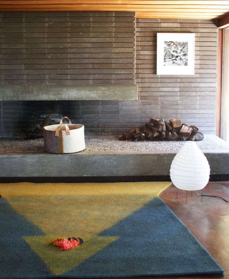 This bold teal and yellow rug is called Tango and it's sure to catch an eye of those who come into the room