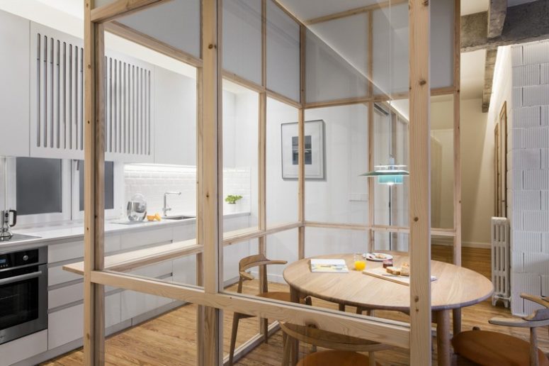 The dining set is done in the same light-colored wood, and it makes the space cozier