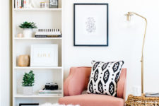 05 a cozy corner with a pink armchair, a floor lamp and some poufs is an ideal reading nook and is very inviting