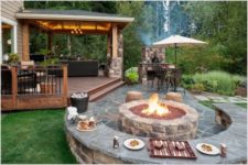 firepit to cook and illuminate a patio