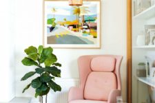 07 an awkward corner with a pink chair and a footrest, hanging wooden lamps and a side table for reading here