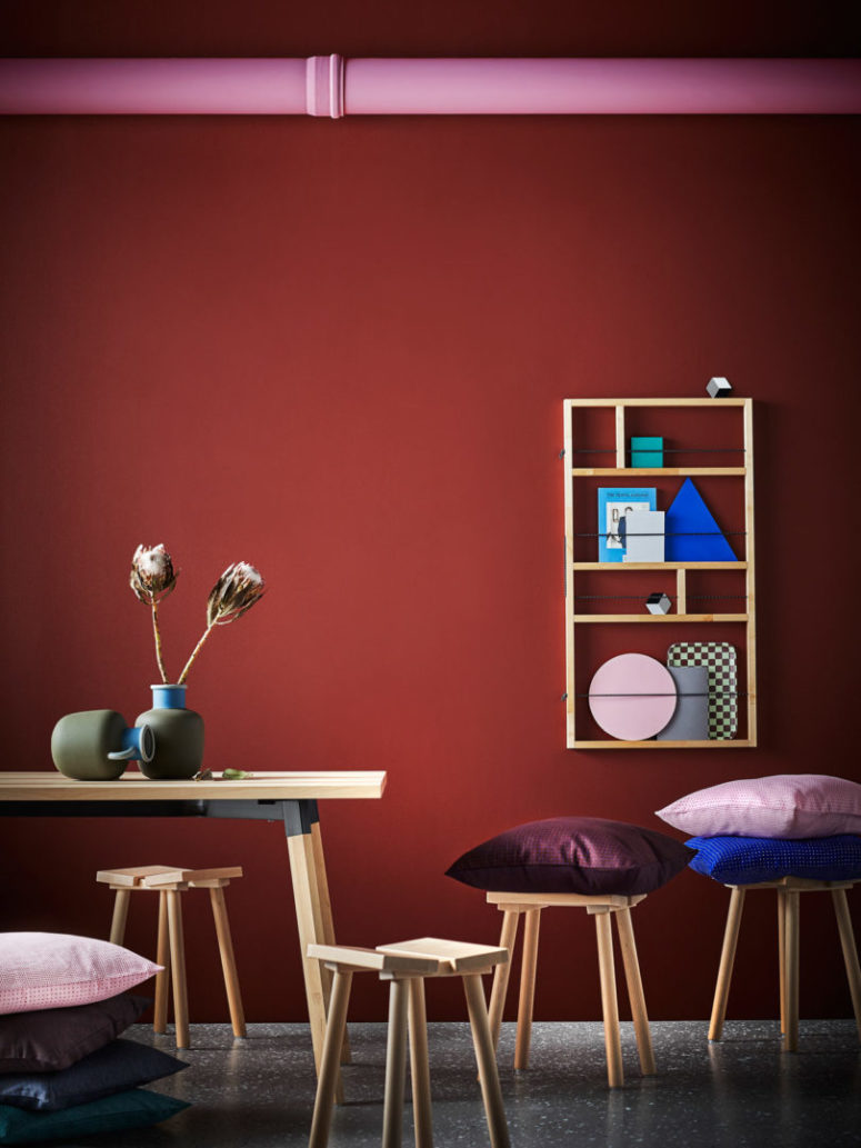 A dining table and matching stools of light-colored wood seems to ask you to hack them