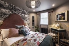 10 The guest bedroom features a black and white botanical print wall, printed textiles and modern furniture