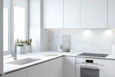 10 a minimalist white kitchen with a marble backsplash and some sculptural details like pots to enliven the space