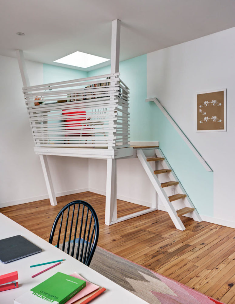 Upstairs there’s a work studio with a “nest” in one corner that’s lit from a skylight above and offers a quiet place to write