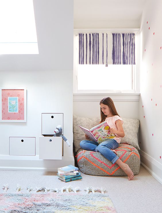 an awkward nook in a kids' room can be used as a cozy reading space with bean bag chairs