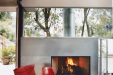 12 a fireplace clad with galvanized steel for a modern space looks lightwieght and chic
