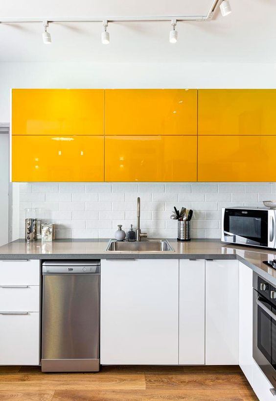 https://www.digsdigs.com/photos/2017/10/12-a-minimalist-yellow-and-white-kitchen-with-stainless-steel-appliances-and-countertops-and-a-subway-tile-backsplash.jpg