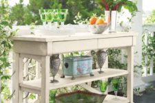 13 a vintage kitchen island can easily become an outdoor bar with an additional storage space