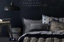 14 a manly space with a platform bed, a vintage lamp and a chalkboard wall for creativity and thoughts